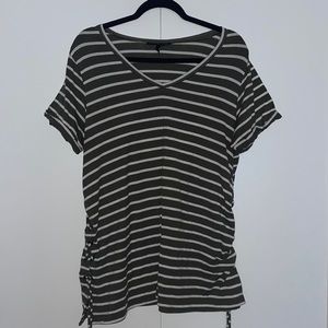 Green and white striped shirt.